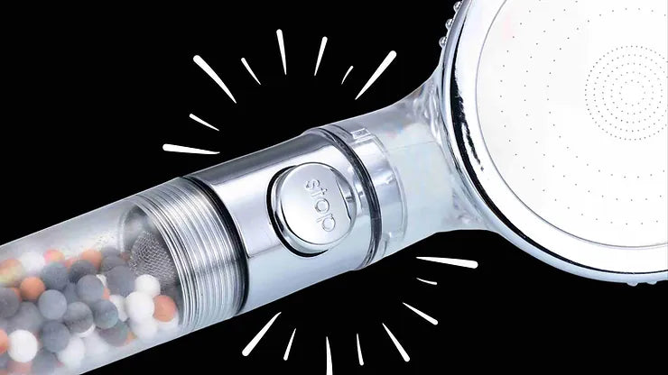 Shower head with stop button for water conservation between rinses